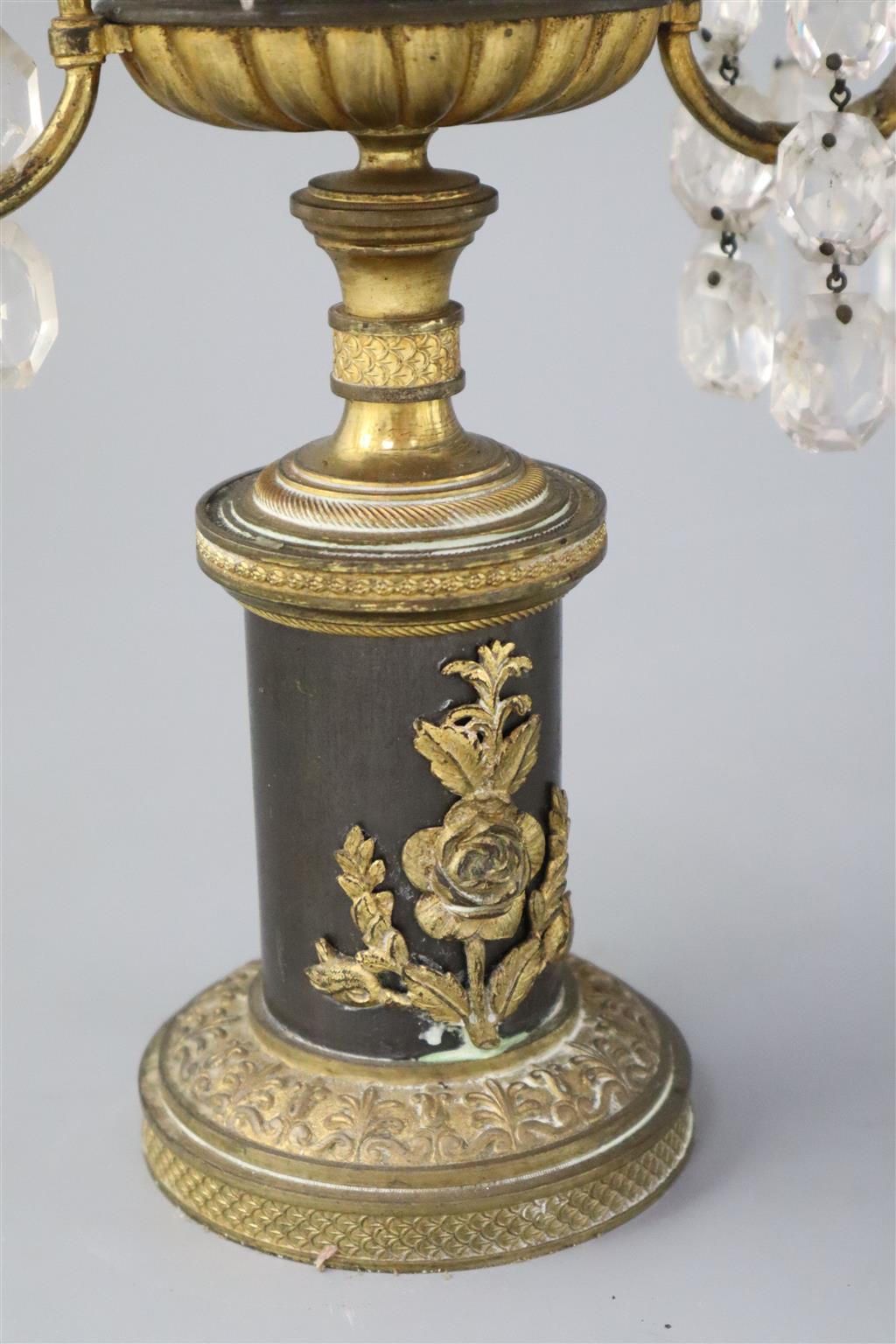 A pair of Regency bronze and ormolu lustre candelabra, height 14in.